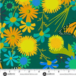 Colorful floral pattern with a ruler at the bottom for scale, on a teal background.