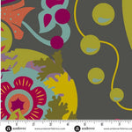 Colorful floral and abstract pattern fabric with a ruler at the bottom