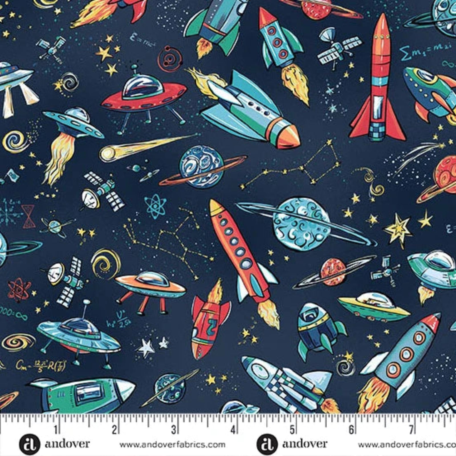 A repeating space-themed pattern on a dark navy background with colorful rockets, UFOs, planets, stars, and rockets in red, teal, yellow, orange, and white. A fabric ruler with the brand name 'andover' is visible along the bottom edge.