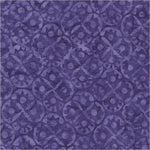 A close-up of a purple patterned fabric or material swatch with an allover repeating ornamental design in slightly lighter and darker purple tones.
