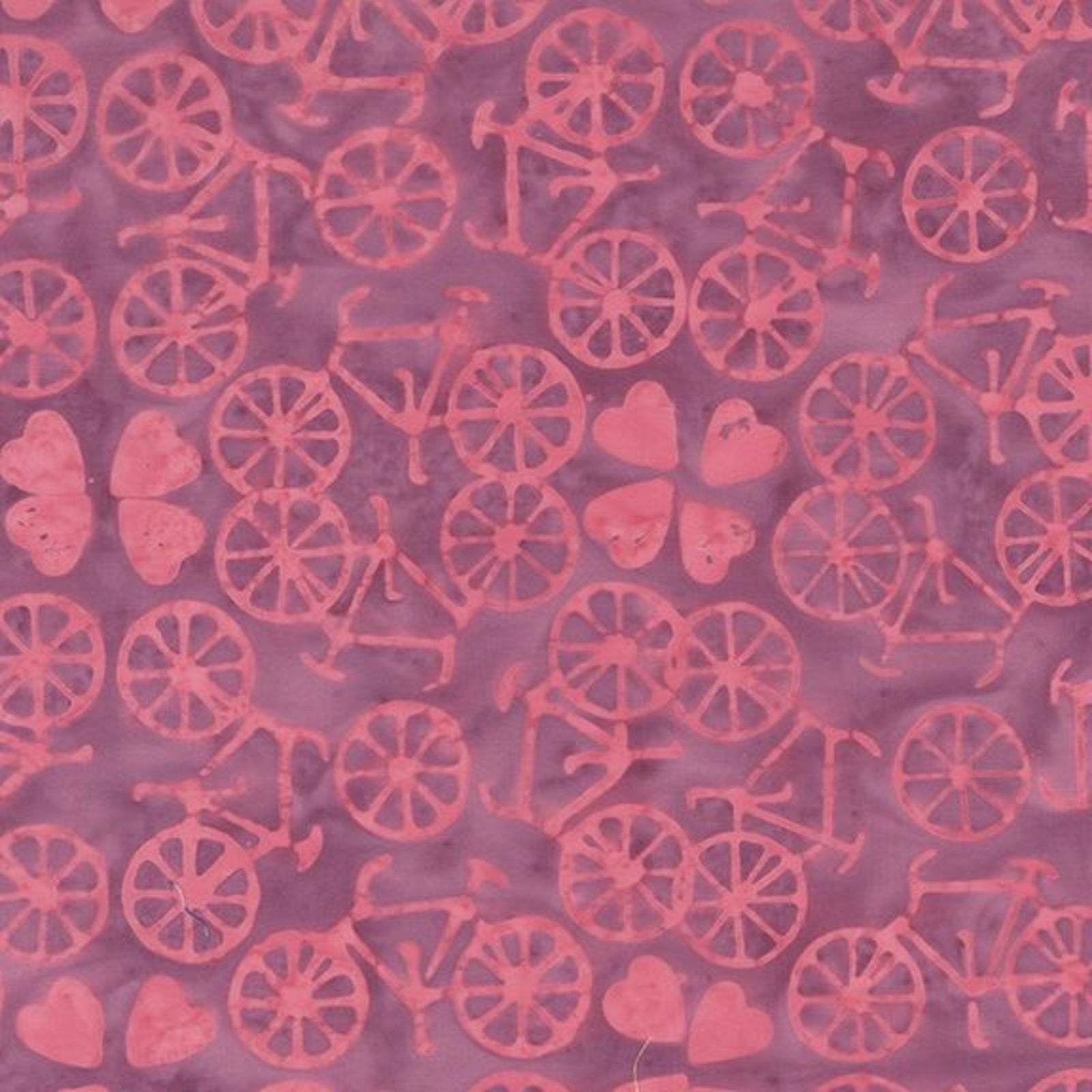 A close-up of a pink and purple patterned fabric featuring a repeating motif of bicycles and hearts.