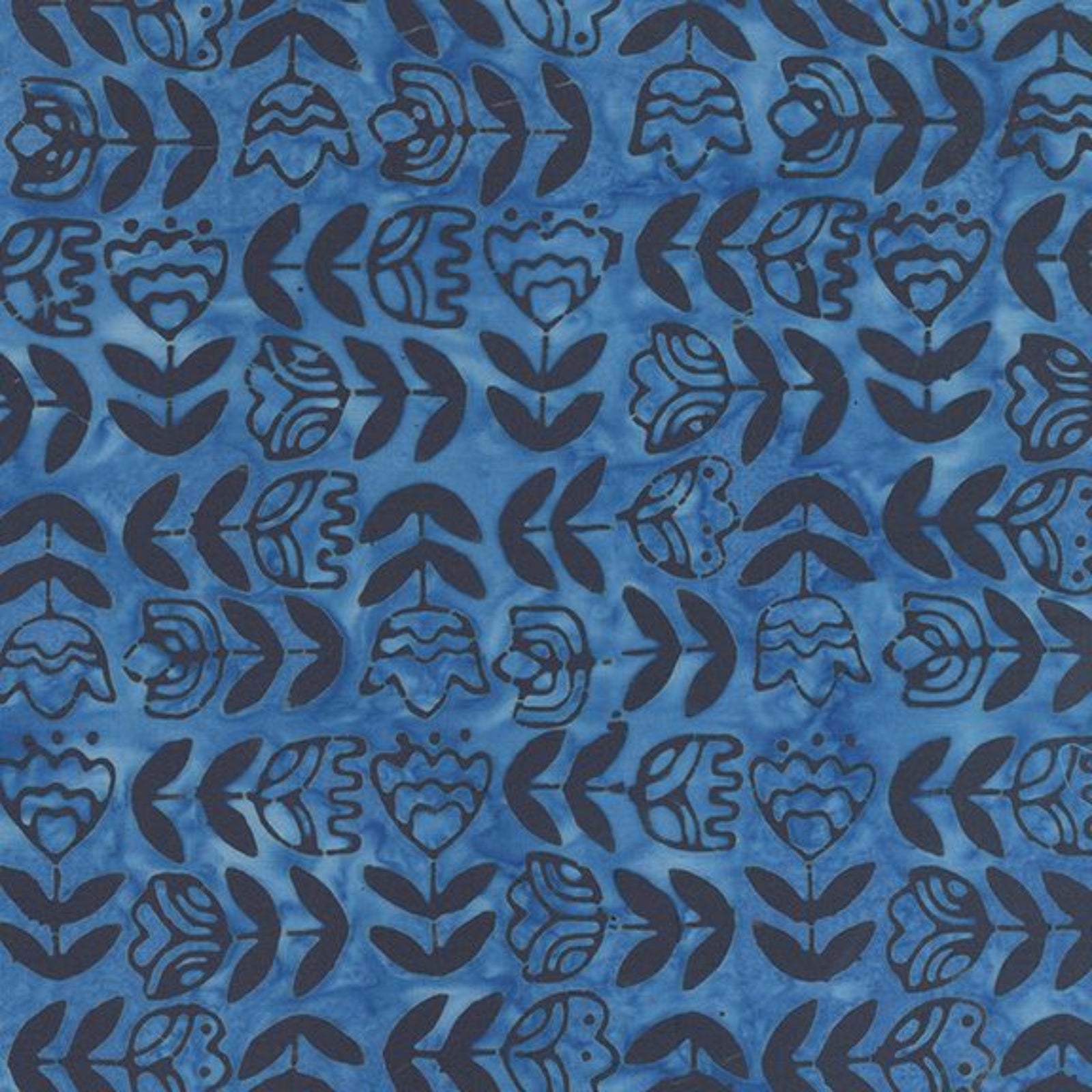 A close-up of a blue patterned fabric or wallpaper featuring a repeating dark navy floral and leaf motif.