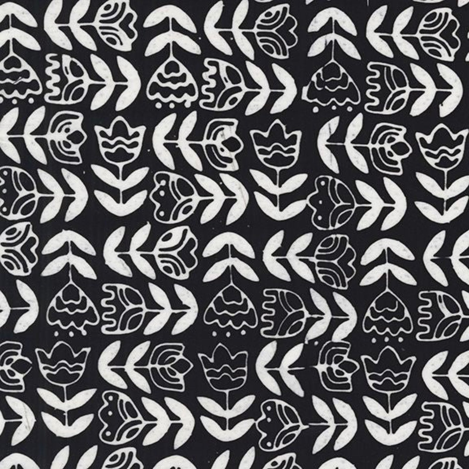 Black and white geometric floral pattern on a black background