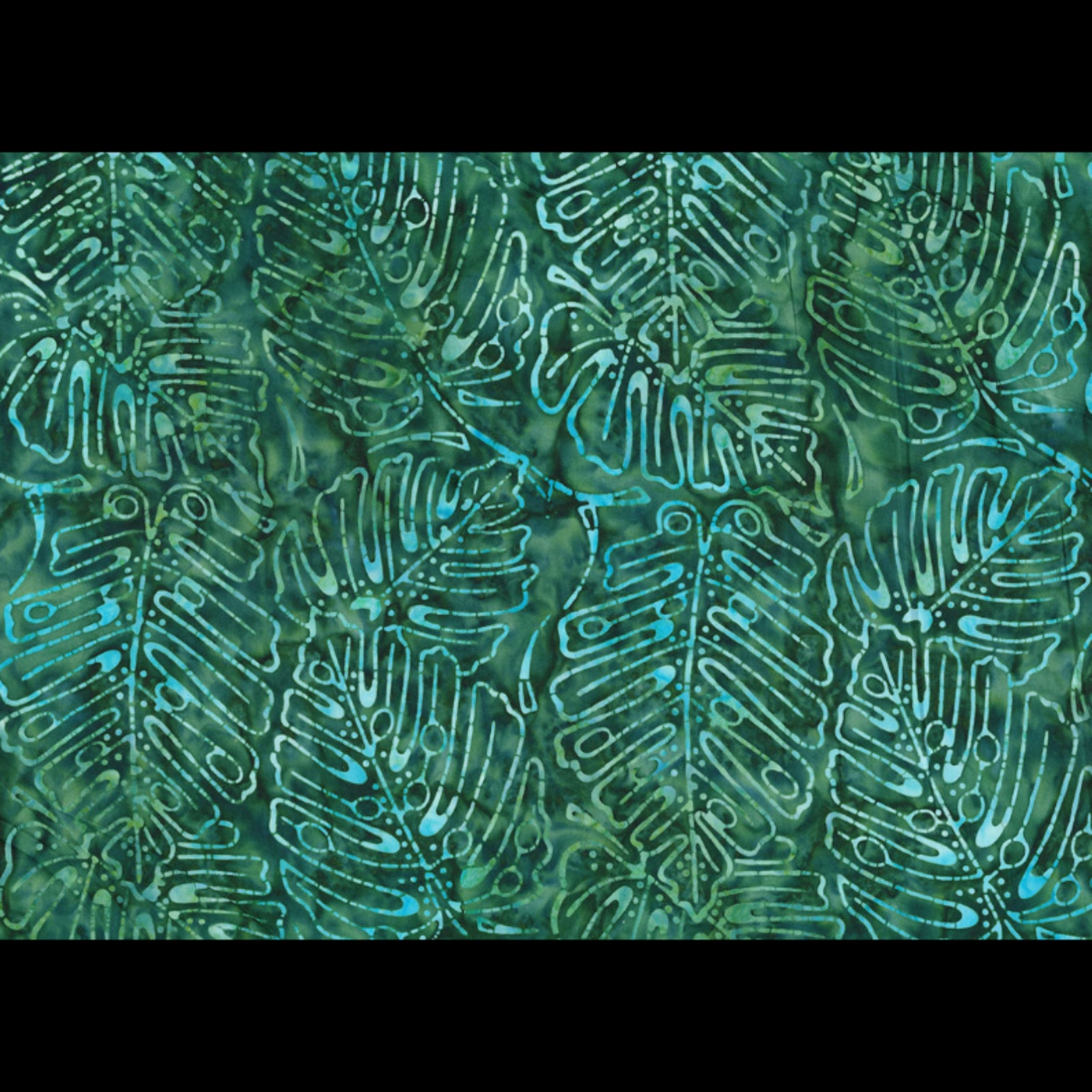 A close-up of a batik fabric pattern featuring stylized tropical leaf motifs in shades of green and turquoise blue.