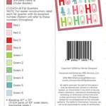 Pattern label with fabric requirements and design elements for a Christmas-themed quilt.