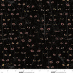 Black fabric with floating eye pattern