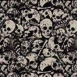 Pattern of skulls and bones in black and white.