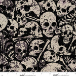 Pattern of skulls and bones on a black background