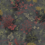 Pattern of red, green, and yellow leaves and branches on a dark background