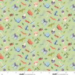 Patterned fabric with colorful insects, mushrooms, and leaves on a green background