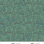 Patterned fabric with small Christmas trees and lights on a green background