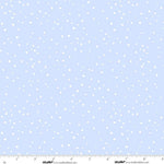Light blue fabric with a scattered white confetti or confuser dot pattern, featuring a white measurement ruler along the bottom edge with studio e branding.