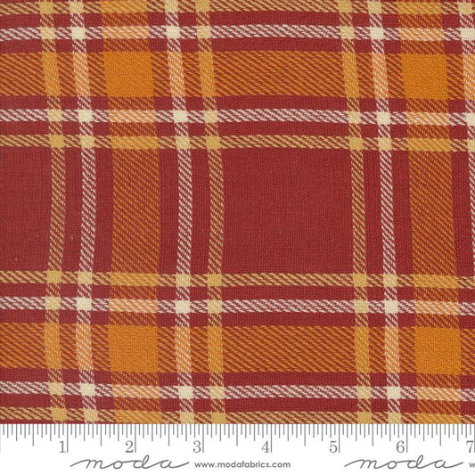 Woven plaid fabric pattern with red and orange colors.