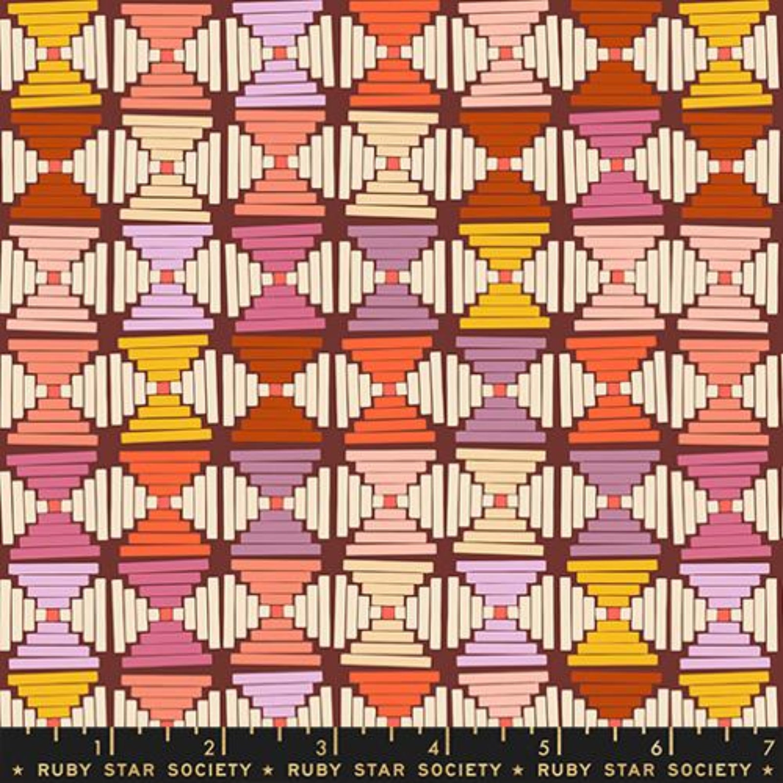 Patterned fabric swatch with geometric design in multiple colors, featuring the Ruby Star Society label.