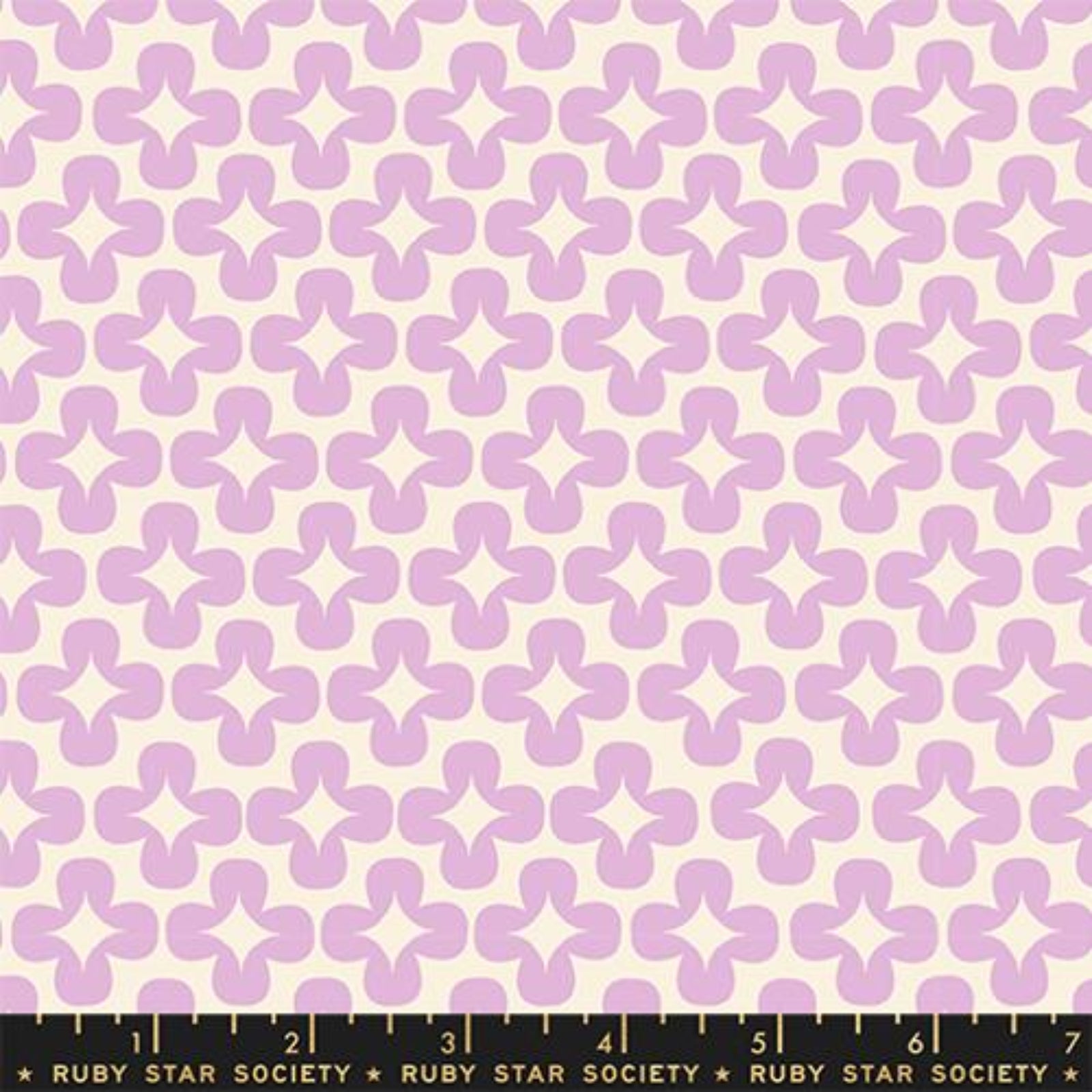 Patterned fabric with purple geometric shapes on a beige background, featuring Ruby Star Society label.