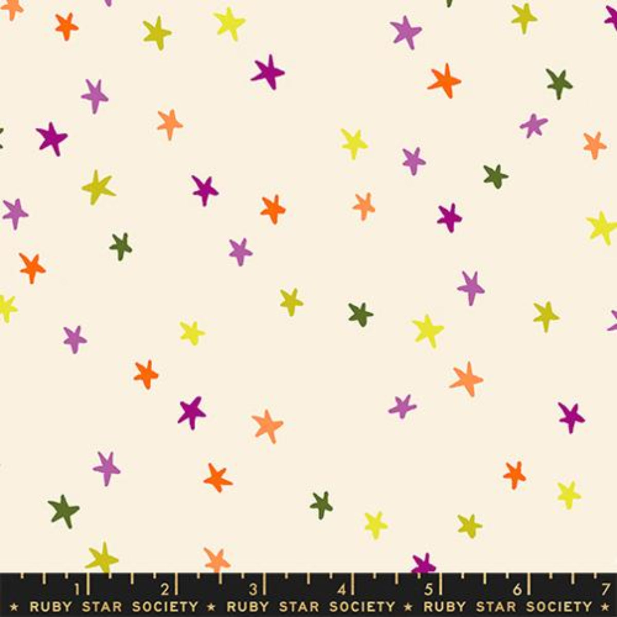Colorful star pattern on a beige background with a ruler at the bottom.