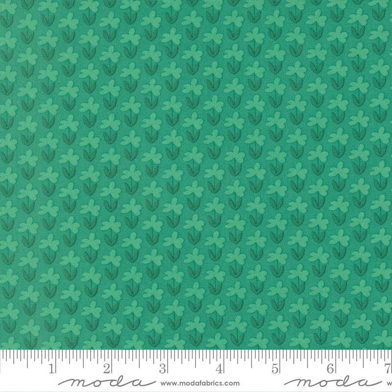 Green fabric with small floral pattern
