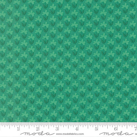 Green fabric with small floral pattern
