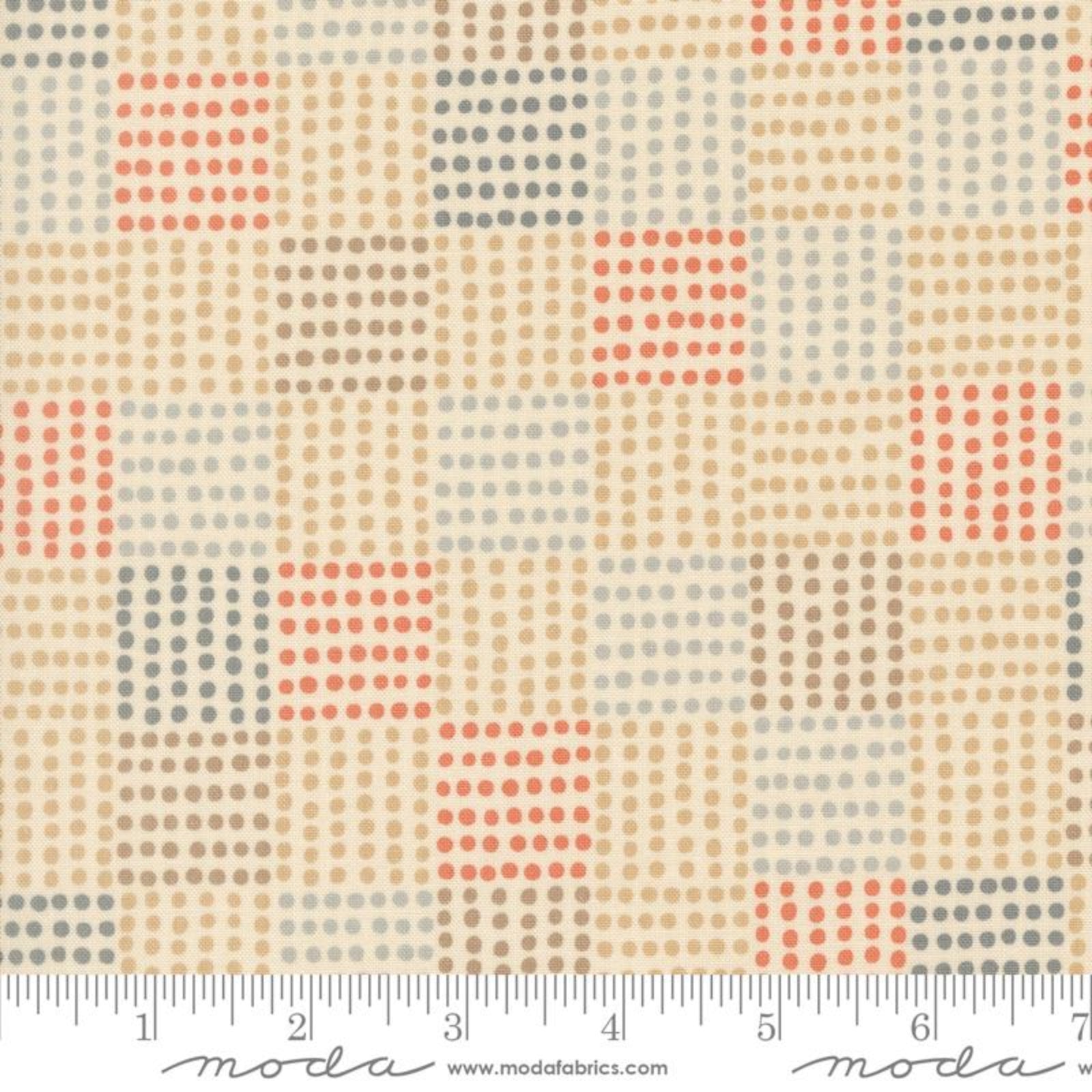 Fabric pattern with a grid of colored dots and a ruler for scale, featuring the Moda Fabrics logo.