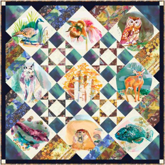 Colorful quilt with various animal illustrations in a patchwork pattern