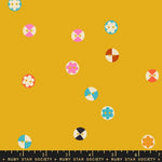 Colorful geometric shapes buttons on a mustard yellow background with a Ruby Star Society label.