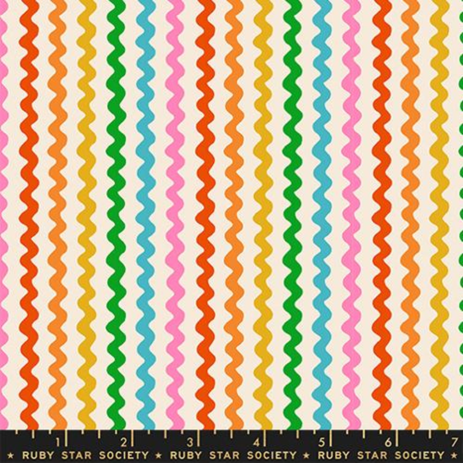 Colorful wavy pattern fabric swatch with a ruler at the bottom
