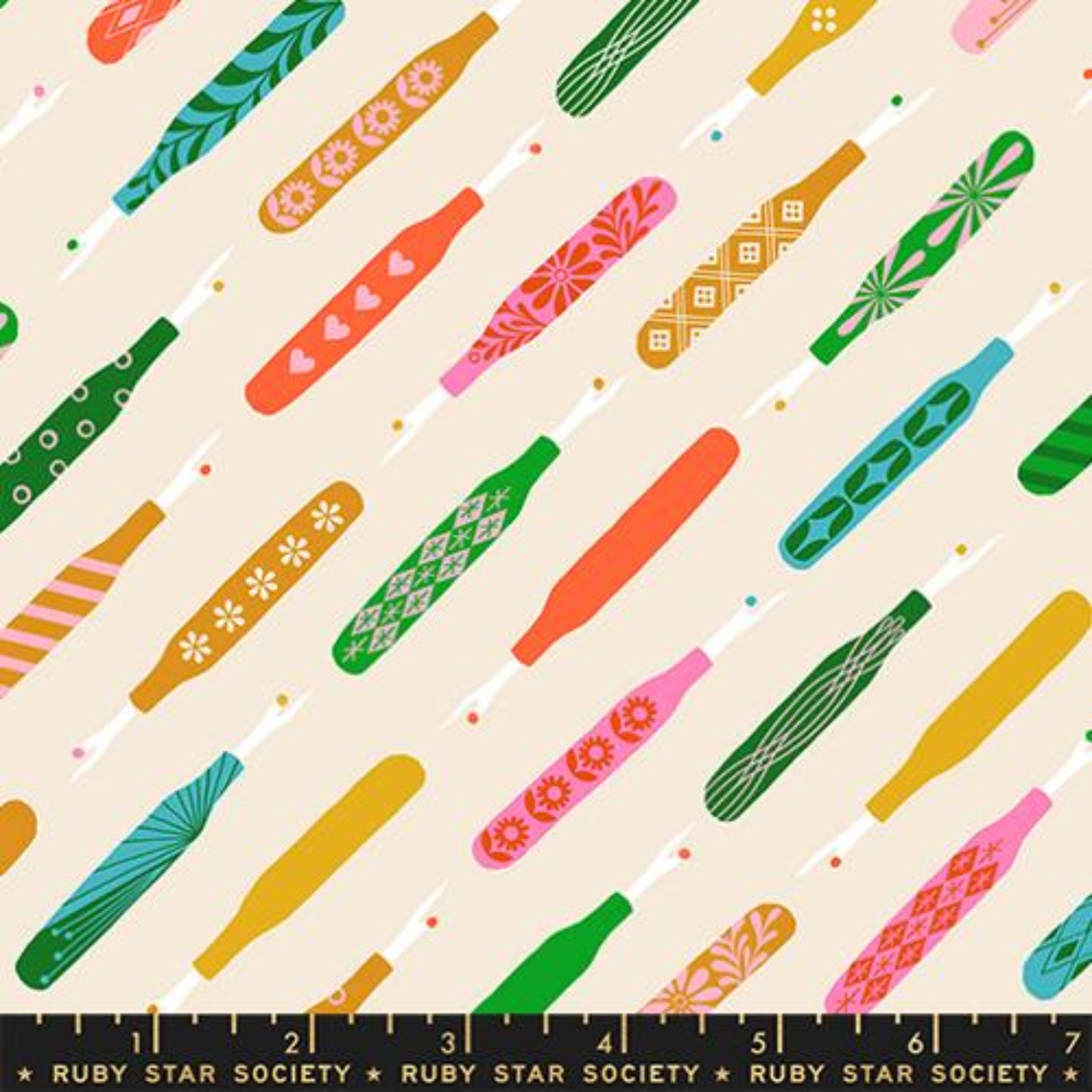 Pattern of colorful seam rippers on a beige background with Ruby Star Society label.