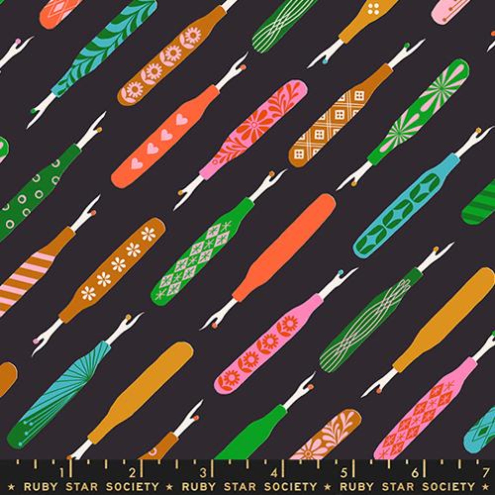Colorful pattern of seam rippers with a ruler at the bottom on a black background, featuring designs by Ruby Star Society.