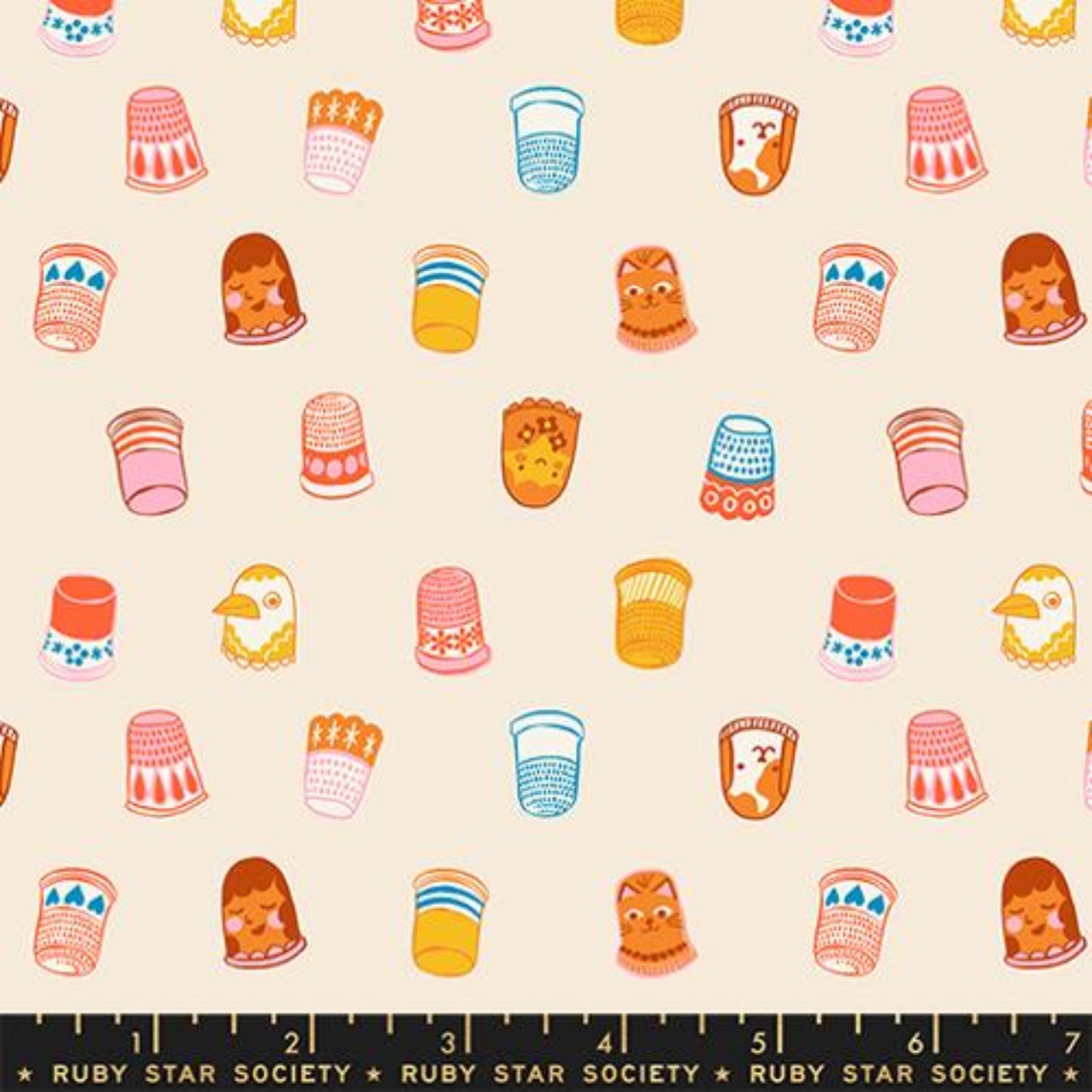 Patterned fabric with colorful thimbles and sewing-related designs on a beige background, featuring Ruby Star Society label.