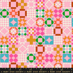 Colorful geometric pattern on a pink background with Ruby Star Society label.