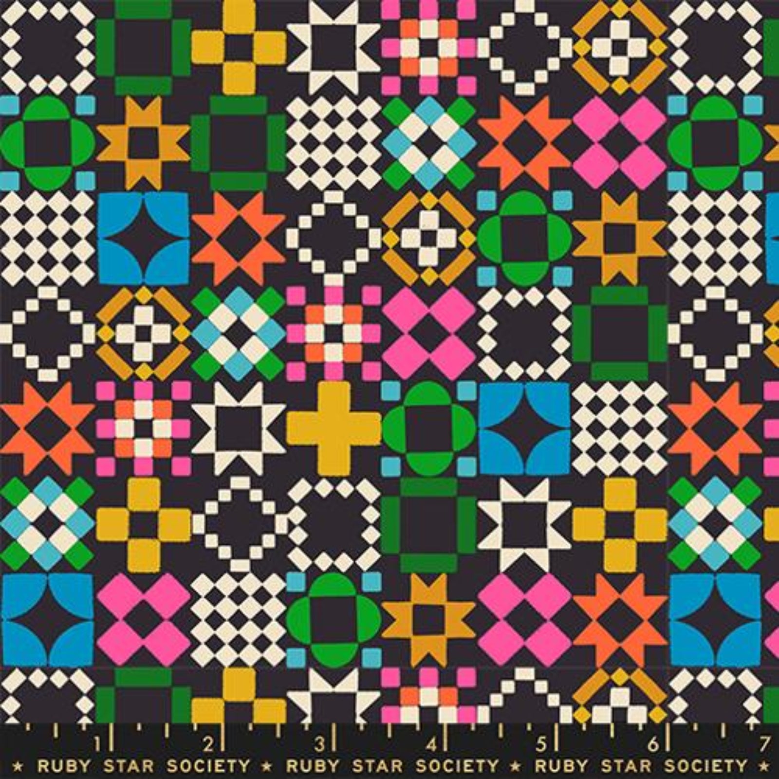 Colorful geometric quilt pattern with a ruler at the bottom on a black background