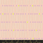 A repeating pattern of matchsticks on a pale peach background, with lavender-purple heads and a few bright yellow-green heads. A black ruler at the bottom shows measurements and the brand name 'RUBY STAR SOCIETY'.