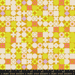 Patterned fabric with geometric shapes on a yellow background, featuring Ruby Star Society label.