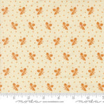 A close-up of a fabric pattern featuring small orange butterfly motifs and tiny orange dots on a warm cream background, with a ruler along the bottom edge and a Modas fabric watermark.