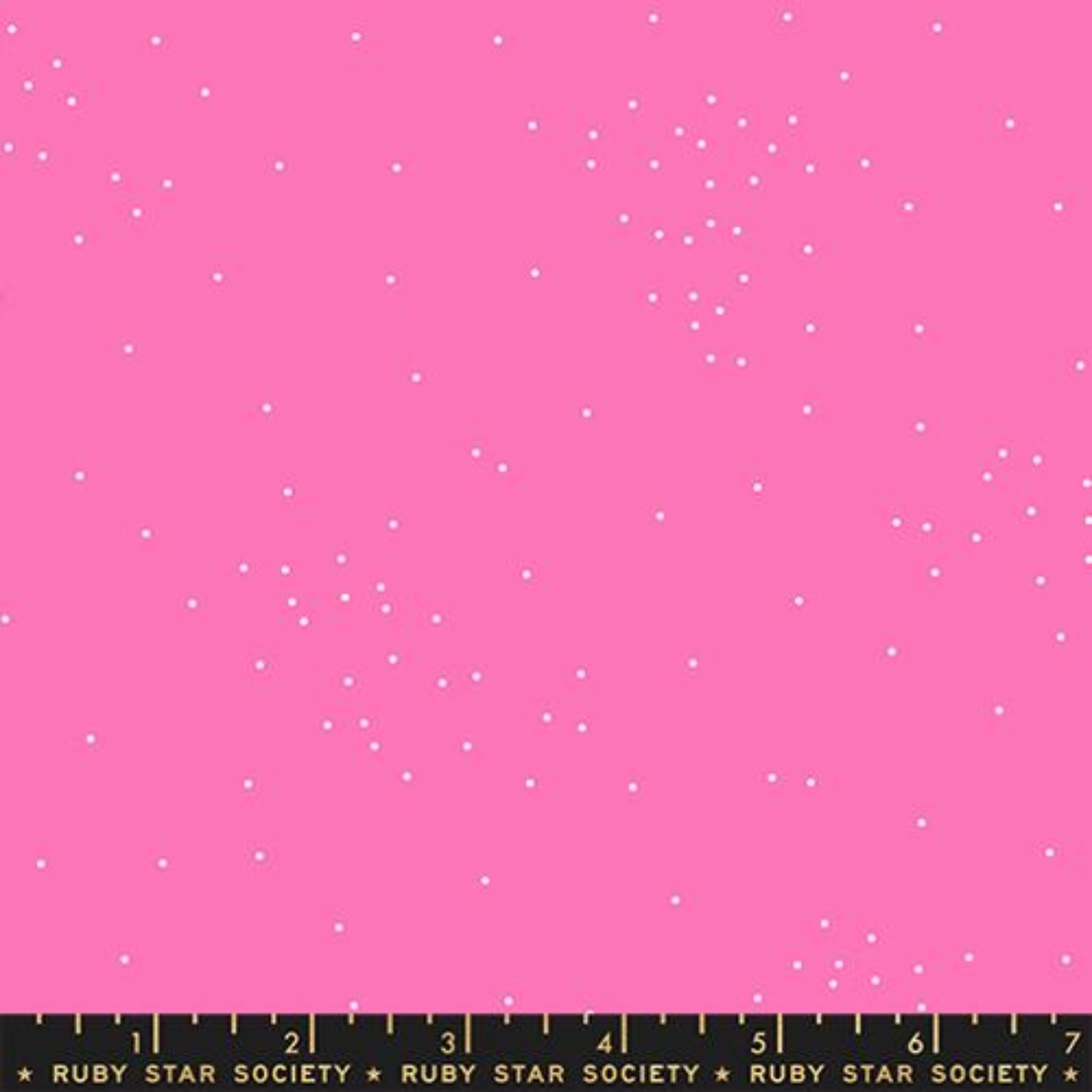 Pink fabric with small white polka dots and a Ruby Star Society label at the bottom.