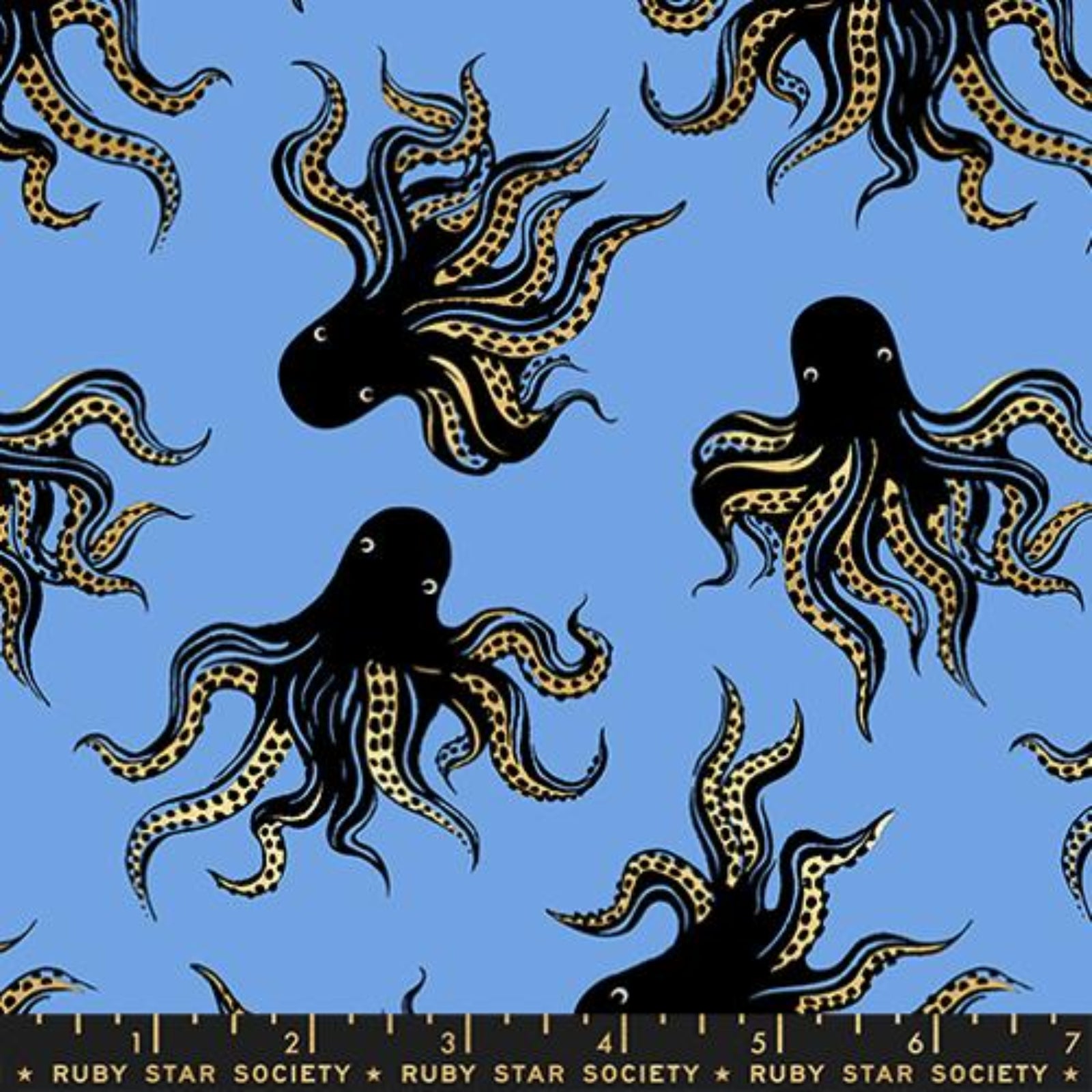 Pattern of black and gold octopuses on a blue background with a ruler at the bottom.