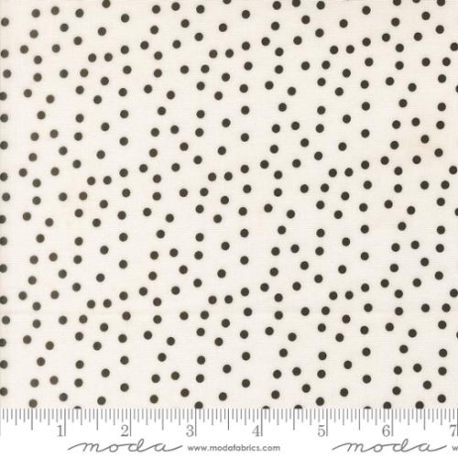 Black polka dots on a white background with Moda label.