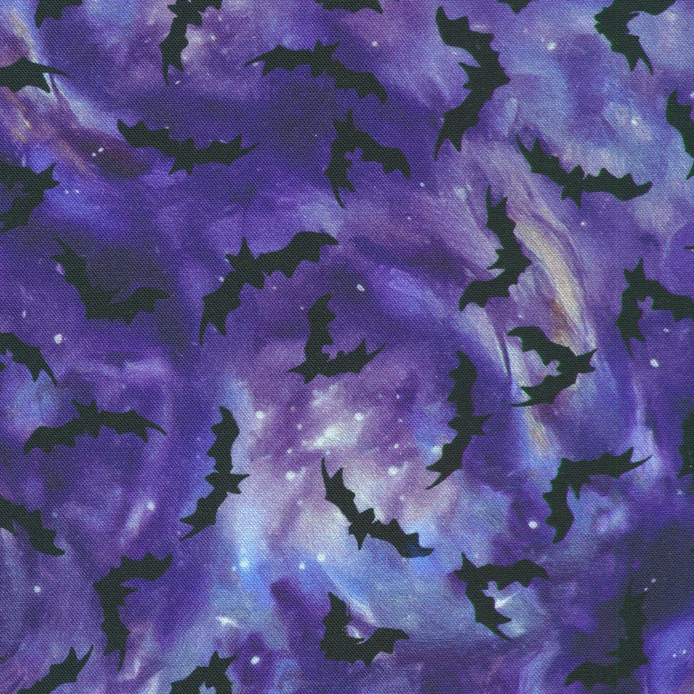 Silhouettes of bats on a purple fabric background