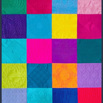 Colorful quilt composed of twenty stitched silk blocks, each featuring a unique quilting design.