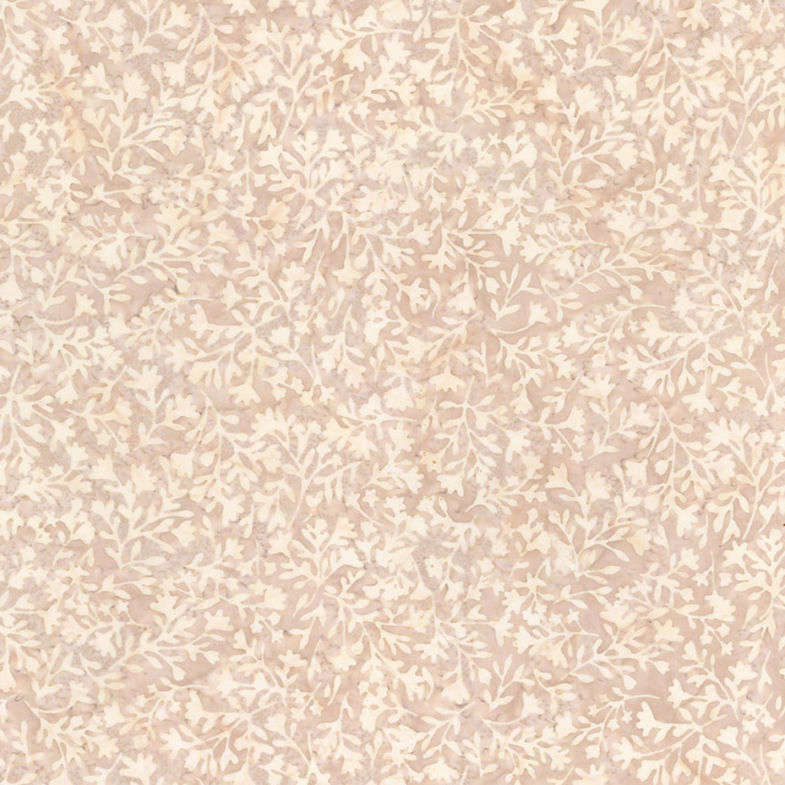A close-up of a repeating floral pattern in soft blush pink and cream, showing delicate leaves and blossoms across the full frame.