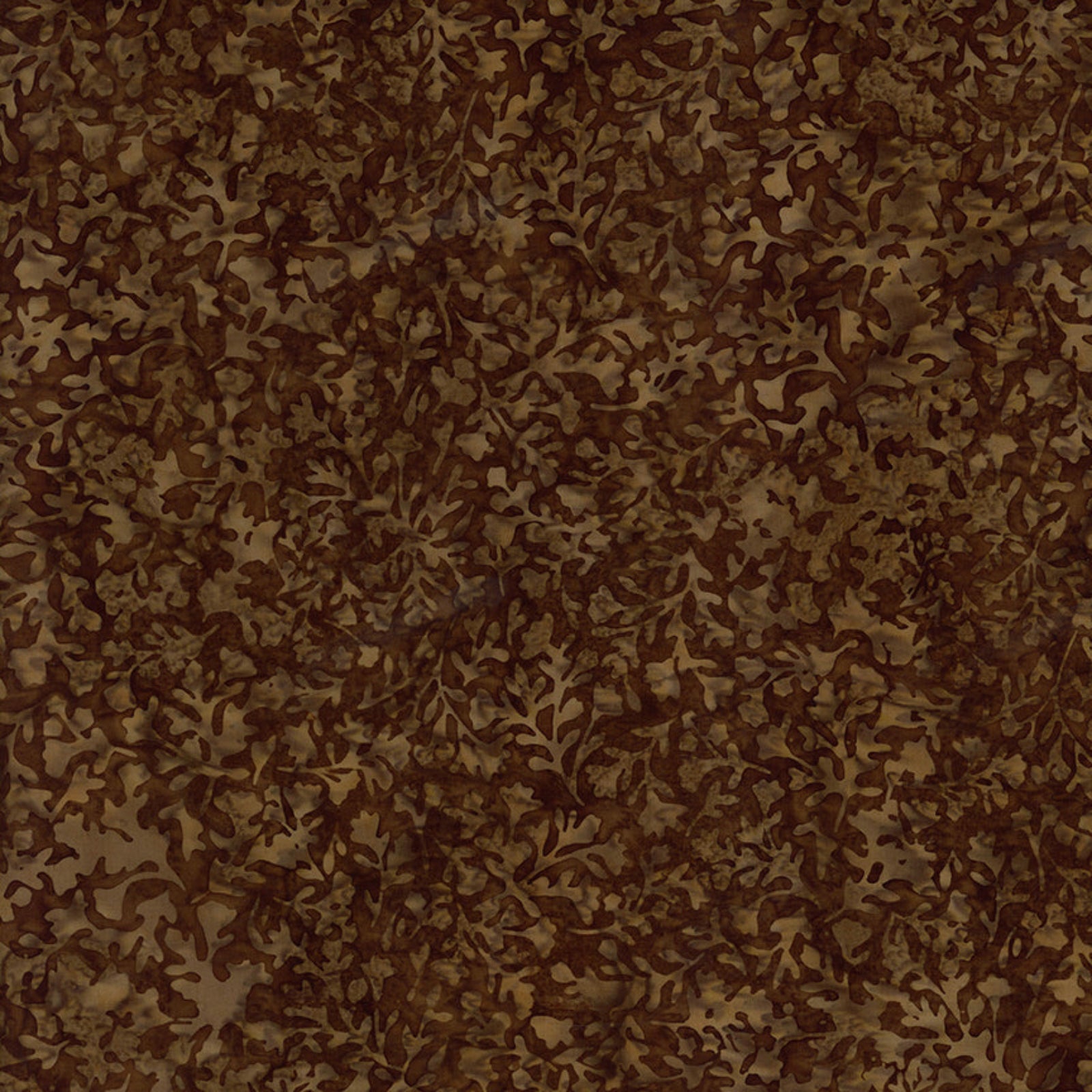 A close-up of a brown and tan camouflage pattern with an organic, leaf-like or bark-like texture filling the entire frame.