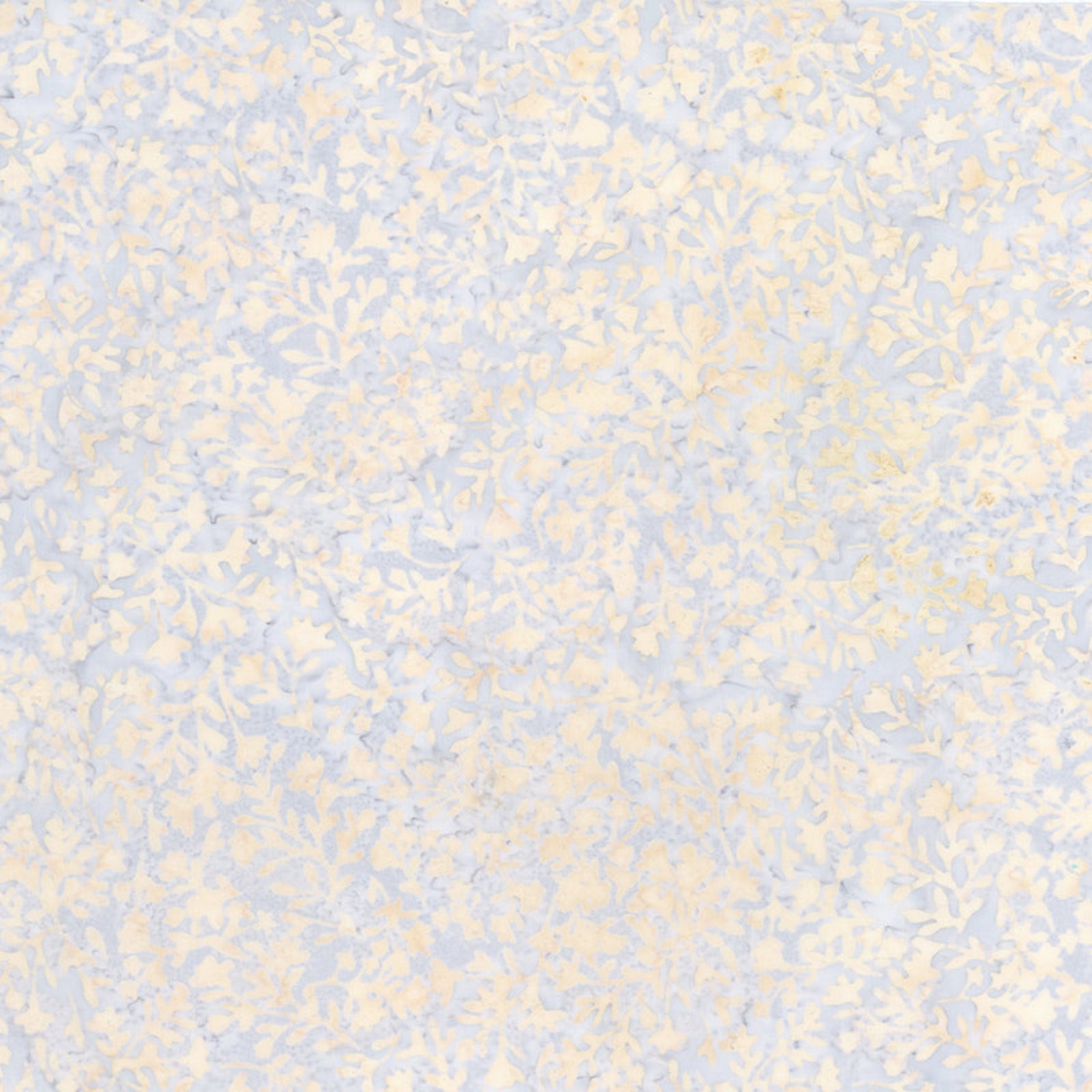 A close-up of a light blue and cream floral patterned fabric 