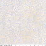 A close-up of a fabric pattern with a light blue and cream floral motif, featuring a ruler scale at the bottom.