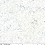White fabric with an all-over repeating leaf pattern, shown flat with a ruler along the bottom edge for scale.