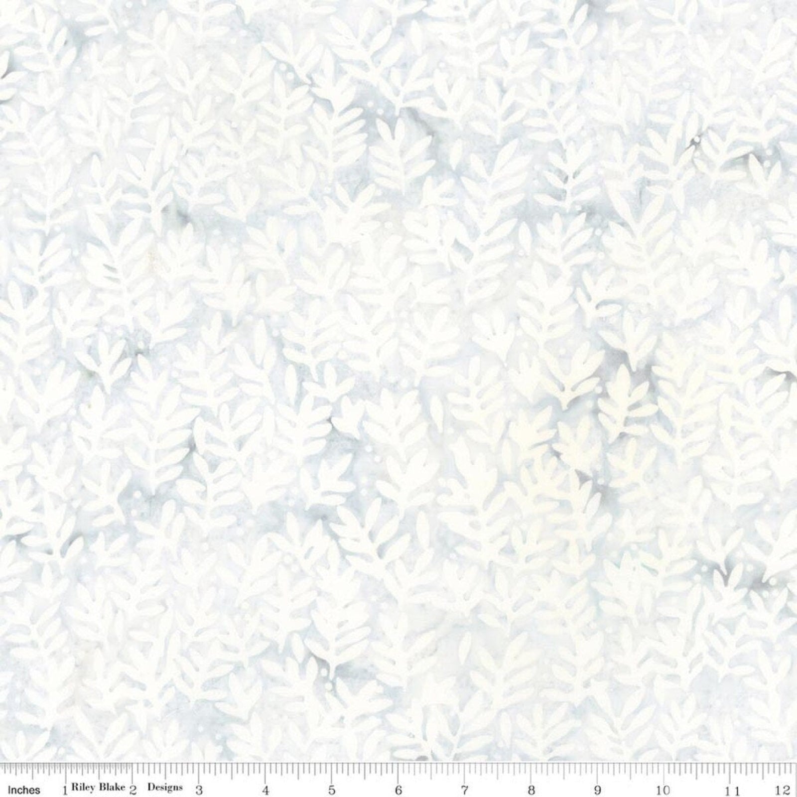White fabric with an all-over repeating leaf pattern, shown flat with a ruler along the bottom edge for scale.