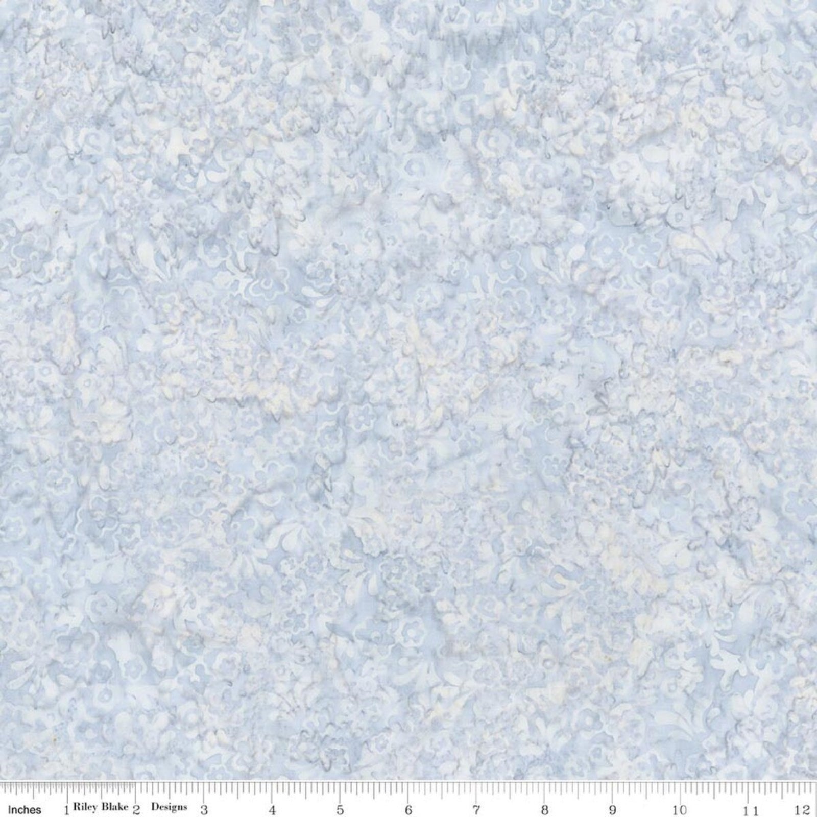 Light blue and white marbled fabric pattern shown flat, with a ruler along the bottom edge for scale.