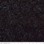Dark floral patterned fabric with a ruler scale at the bottom showing inches and a brand label reading Riley Blake Boutique.