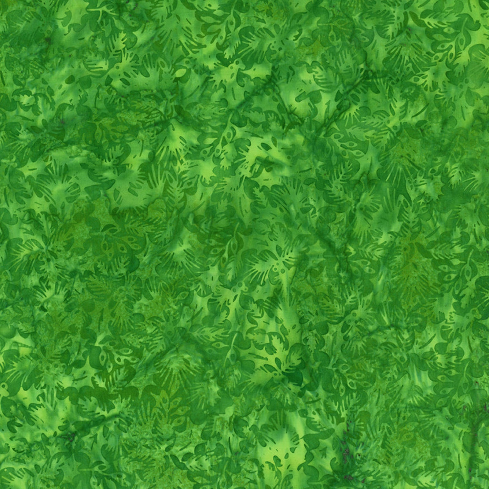A close-up of a green patterned fabric or wallpaper texture with organic leaf-like motifs in varying shades of green.