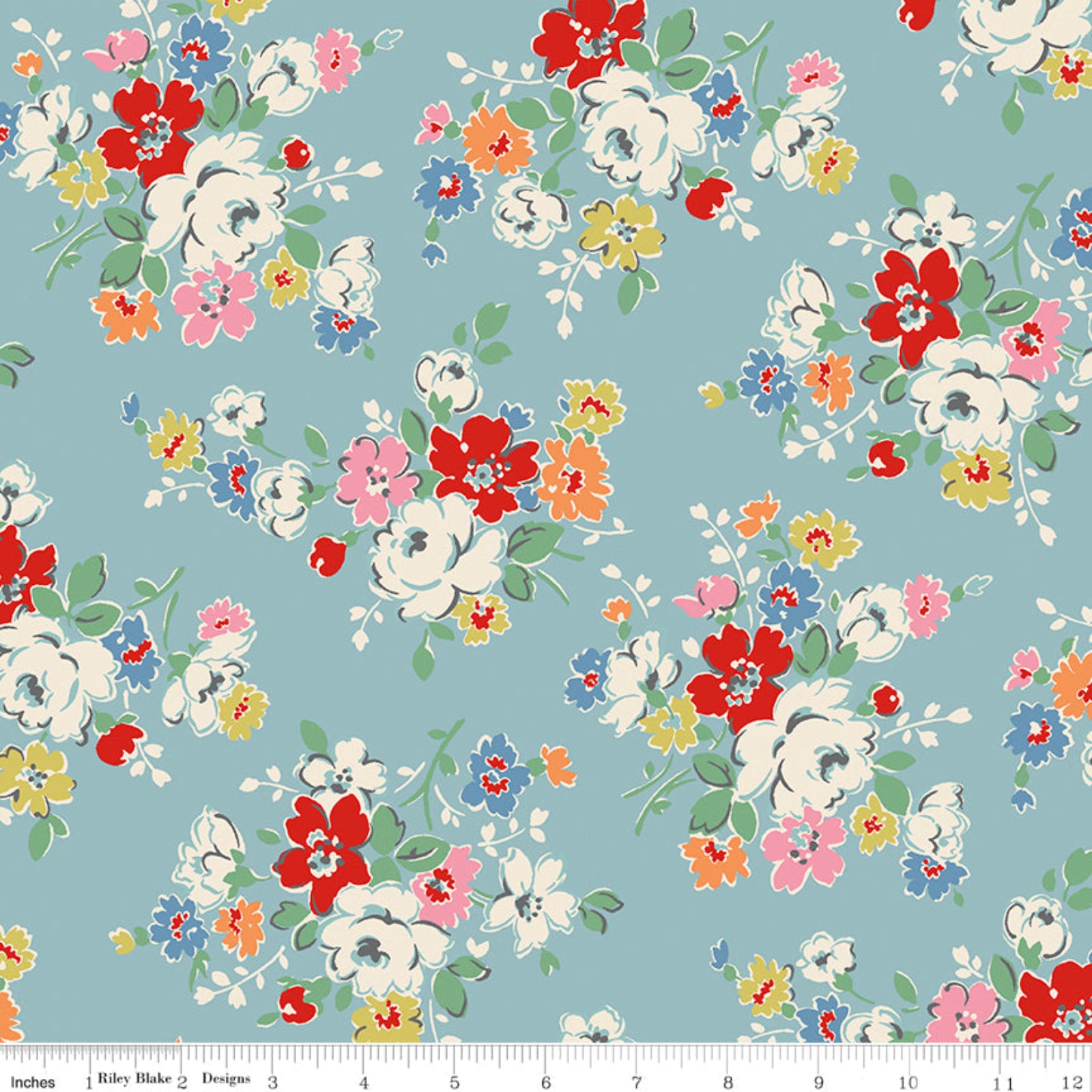Floral pattern fabric with a ruler at the bottom on a blue background