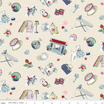 Patterned fabric with various objects and a ruler for scale on a beige background